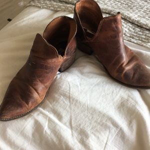 Worn Steve Madden brown boots